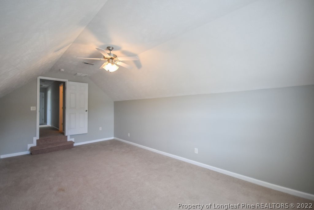 6700 Valley Falls Road Hope Mills, NC 28348 - Photo 33 of 48 a view of an empty room with a ceiling fan