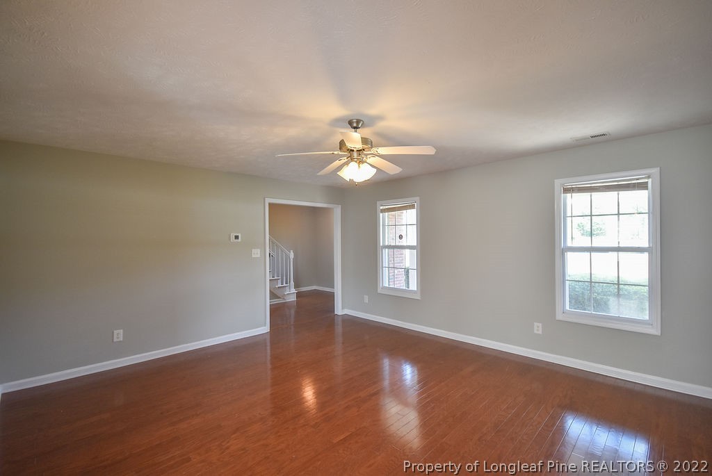 6700 Valley Falls Road Hope Mills, NC 28348 - Photo 9 of 48 a view of a livingroom with a ceiling fan and window