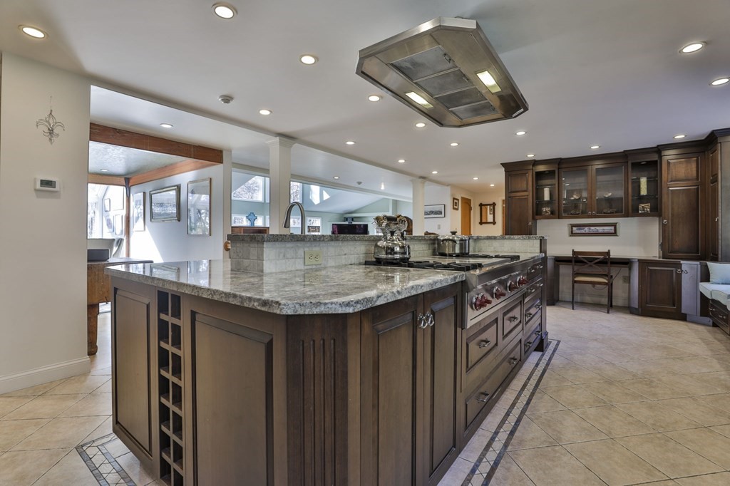 13 Haskell Lane Harvard, MA 01451 - Photo 13 of 39 a kitchen with stainless steel appliances granite countertop a kitchen island a stove and a sink