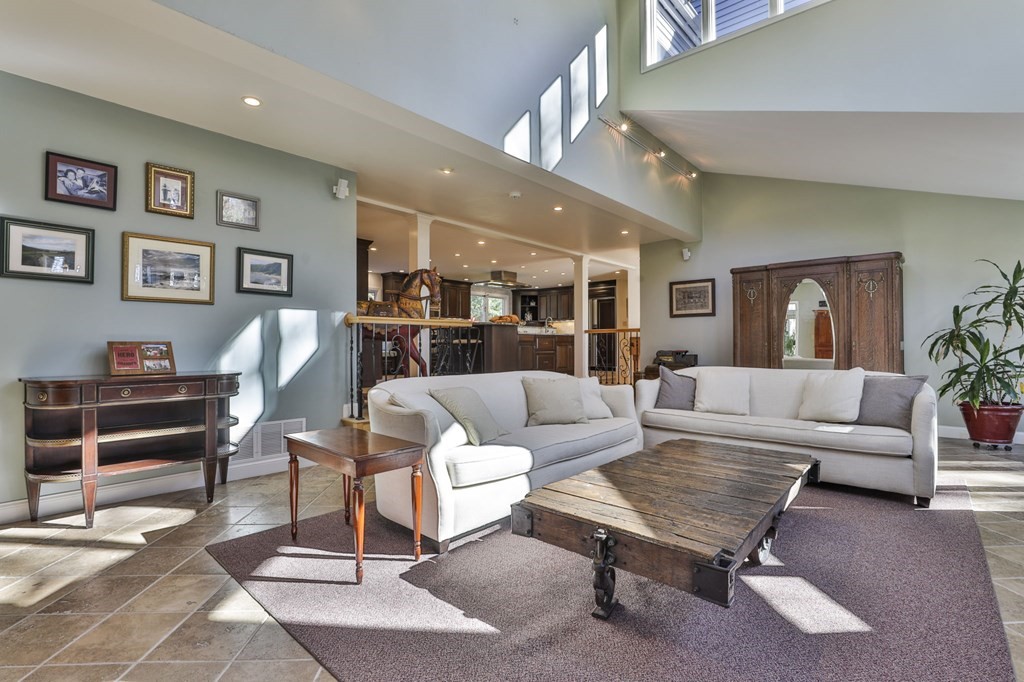 13 Haskell Lane Harvard, MA 01451 - Photo 20 of 39 a living room with furniture a desk and chair with potted plants