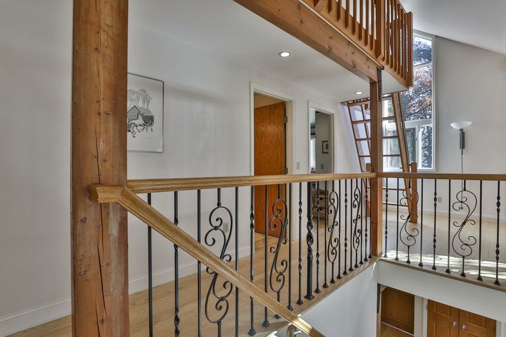 13 Haskell Lane Harvard, MA 01451 - Photo 27 of 39 a view of staircase with lots of windows and wooden floor