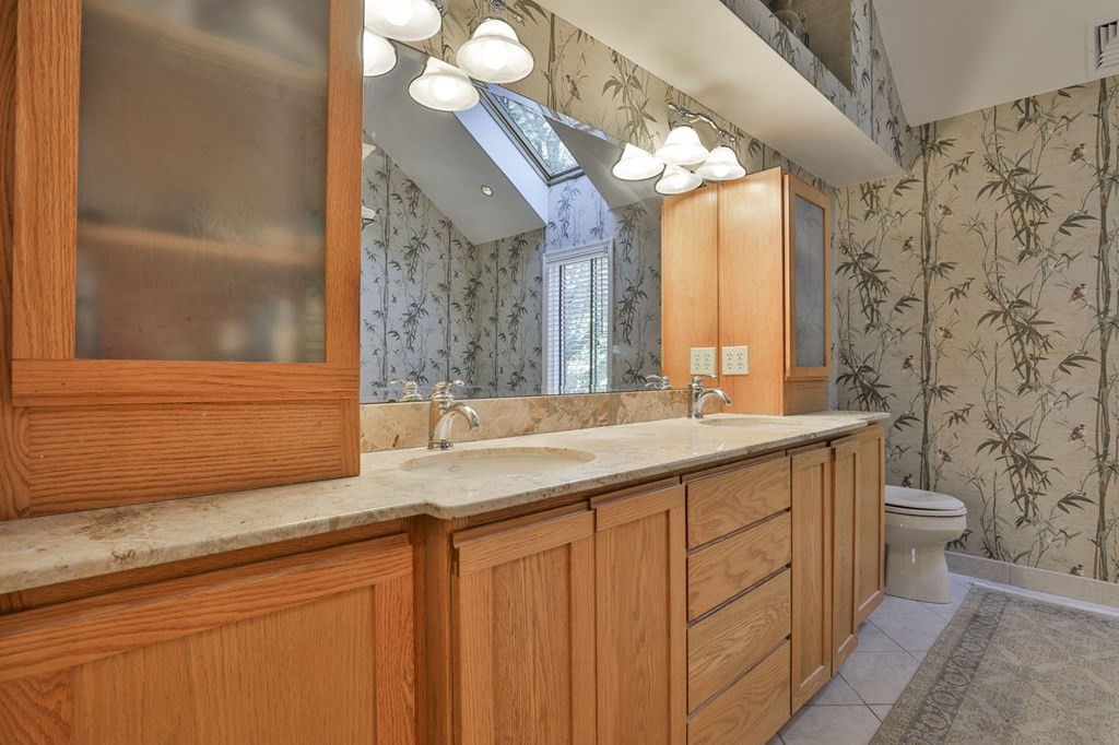 13 Haskell Lane Harvard, MA 01451 - Photo 35 of 39 a bathroom with a granite countertop sink and a mirror