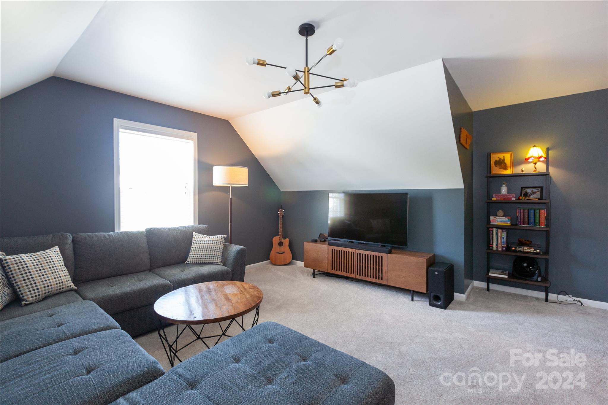 2304 Coltsgate Road Waxhaw, NC 28173 - Photo 19 of 29 a living room with furniture and a flat screen tv