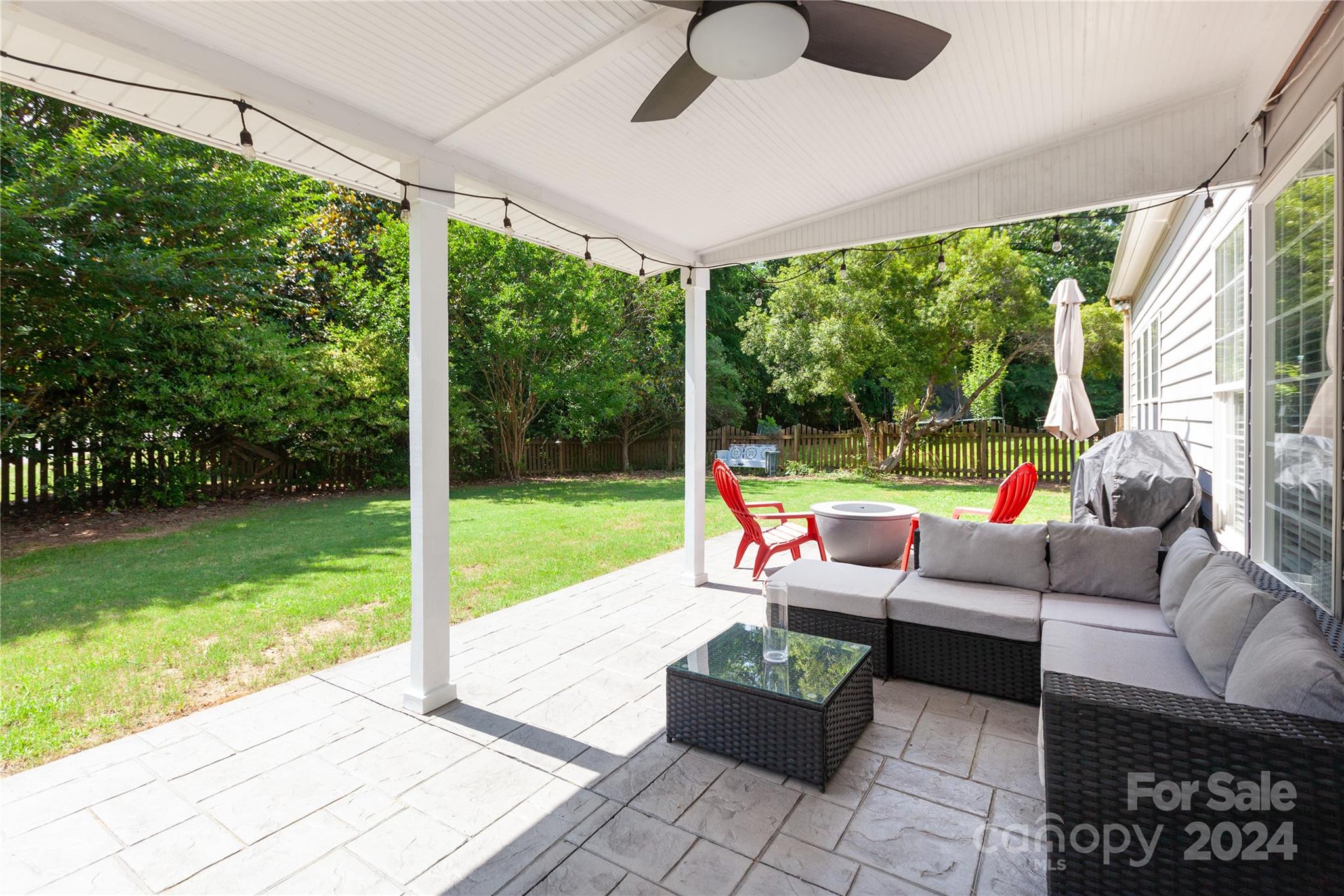 2304 Coltsgate Road Waxhaw, NC 28173 - Photo 25 of 29 a sitting area with furniture and garden view