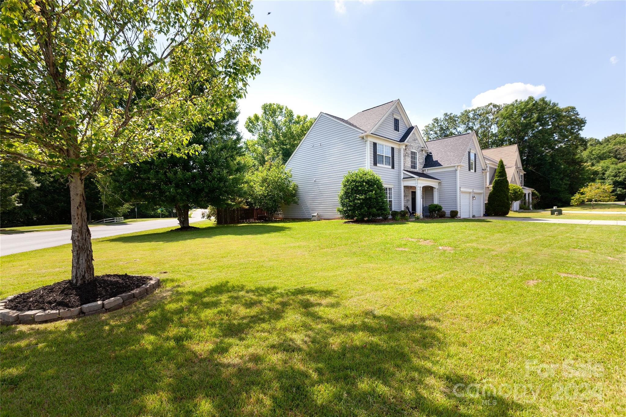 2304 Coltsgate Road Waxhaw, NC 28173 - Photo 29 of 29 a view of a house with swimming pool