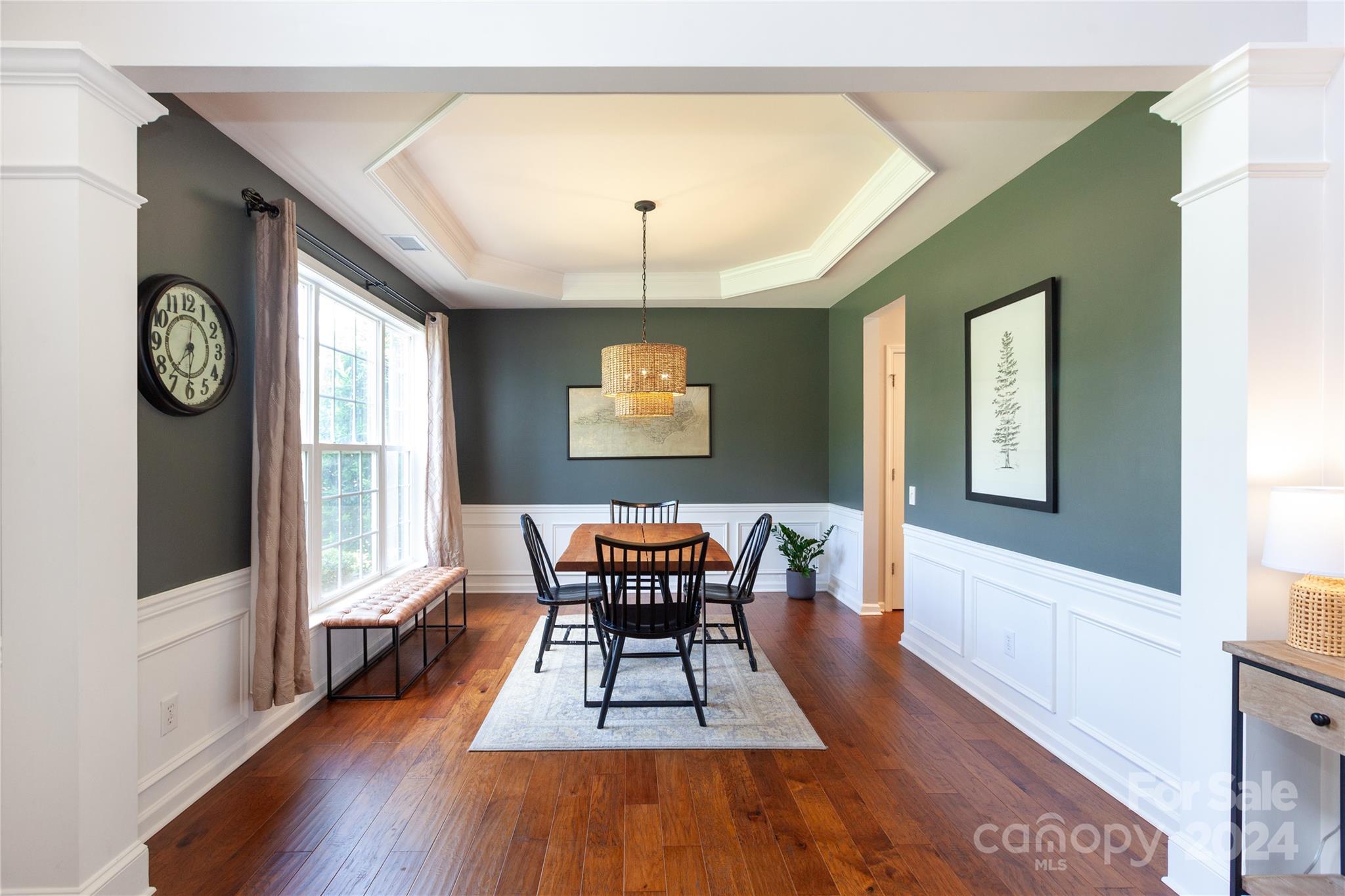 2304 Coltsgate Road Waxhaw, NC 28173 - Photo 3 of 29 a view of a dining room with furniture window and wooden floor