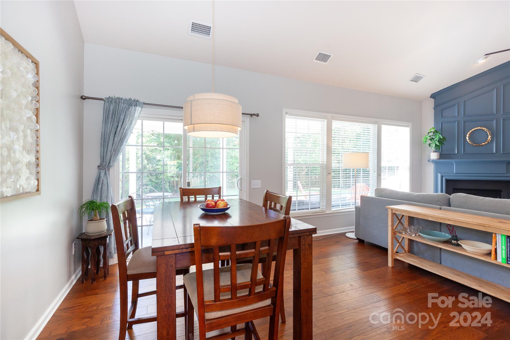 2304 Coltsgate Road Waxhaw, NC 28173 - Photo 9 of 29 a view of a dining room with furniture window and wooden floor
