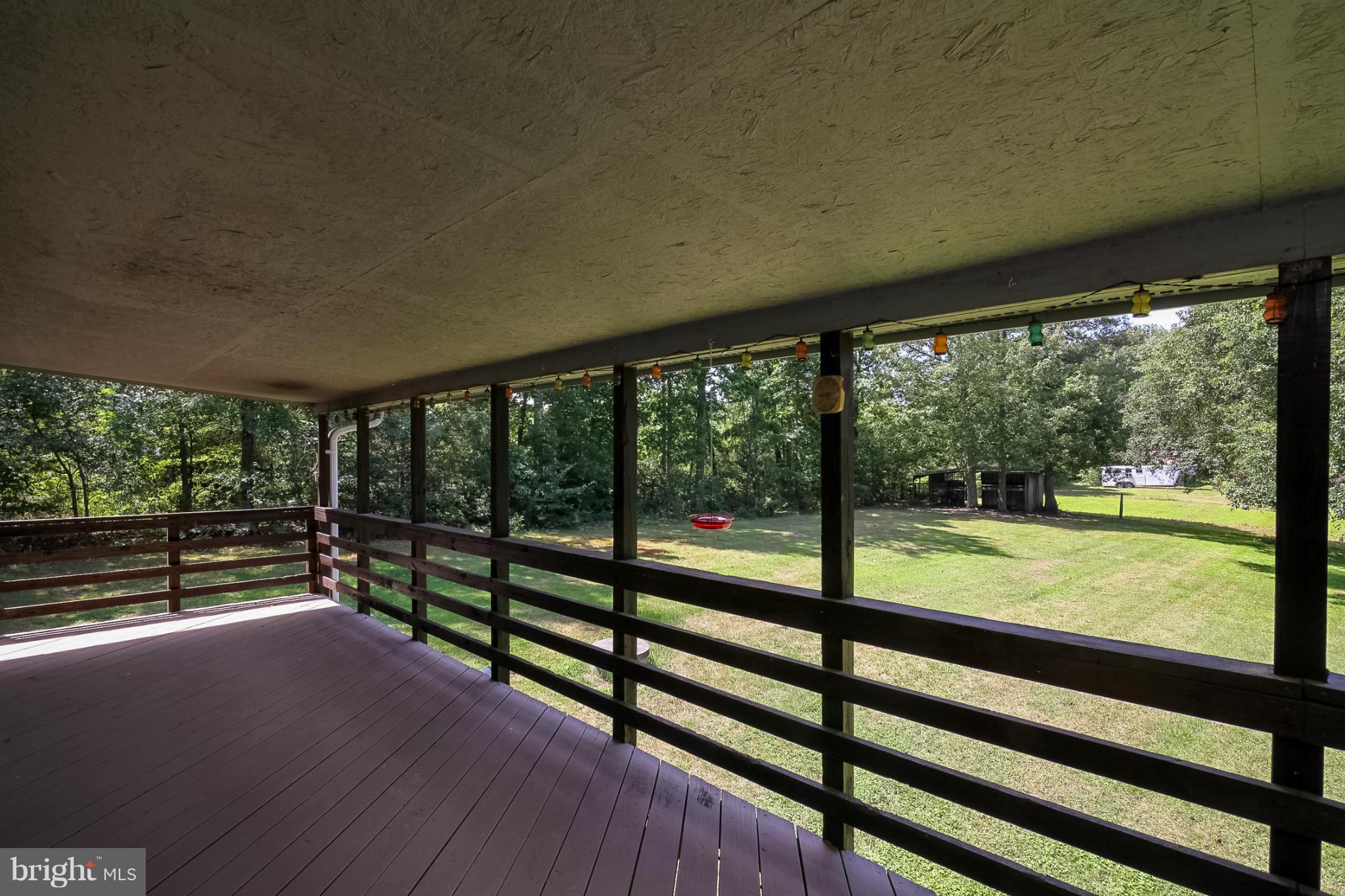 13088 Elk Ridge Road Fredericksburg, VA 22406 - Photo 18 of 30 Covered Deck overlooking Pond