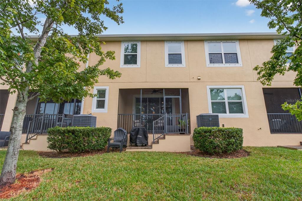 2007 Palm Key Avenue Oldsmar, FL 34677 - Photo 19 of 54 front view of a house with a yard