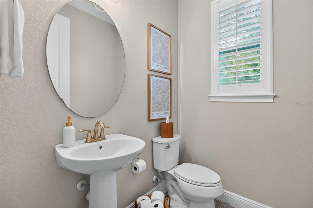 2007 Palm Key Avenue Oldsmar, FL 34677 - Photo 20 of 54 a bathroom with a sink toilet and a mirror