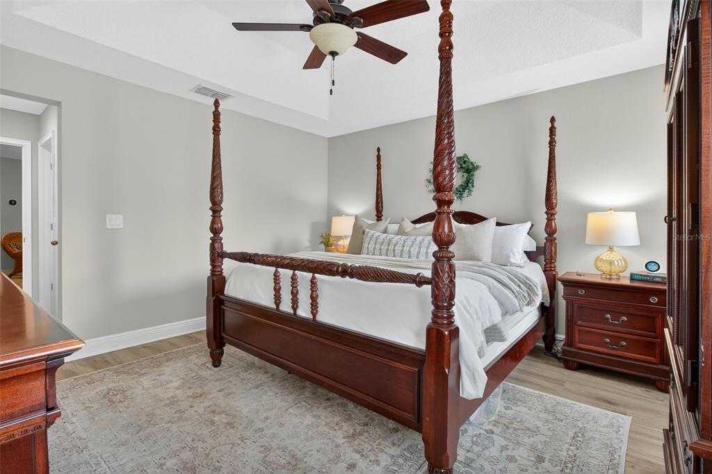 2007 Palm Key Avenue Oldsmar, FL 34677 - Photo 23 of 54 a bedroom with a bed and a chandelier