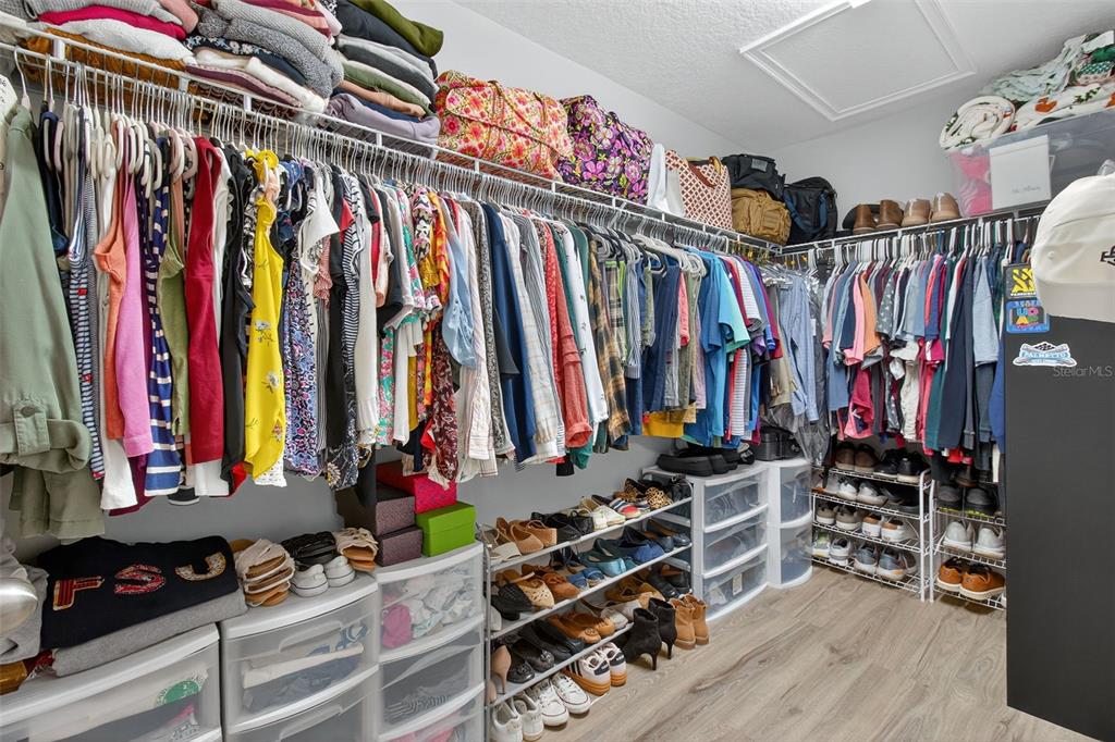2007 Palm Key Avenue Oldsmar, FL 34677 - Photo 27 of 54 a view of walk in closet with clothes