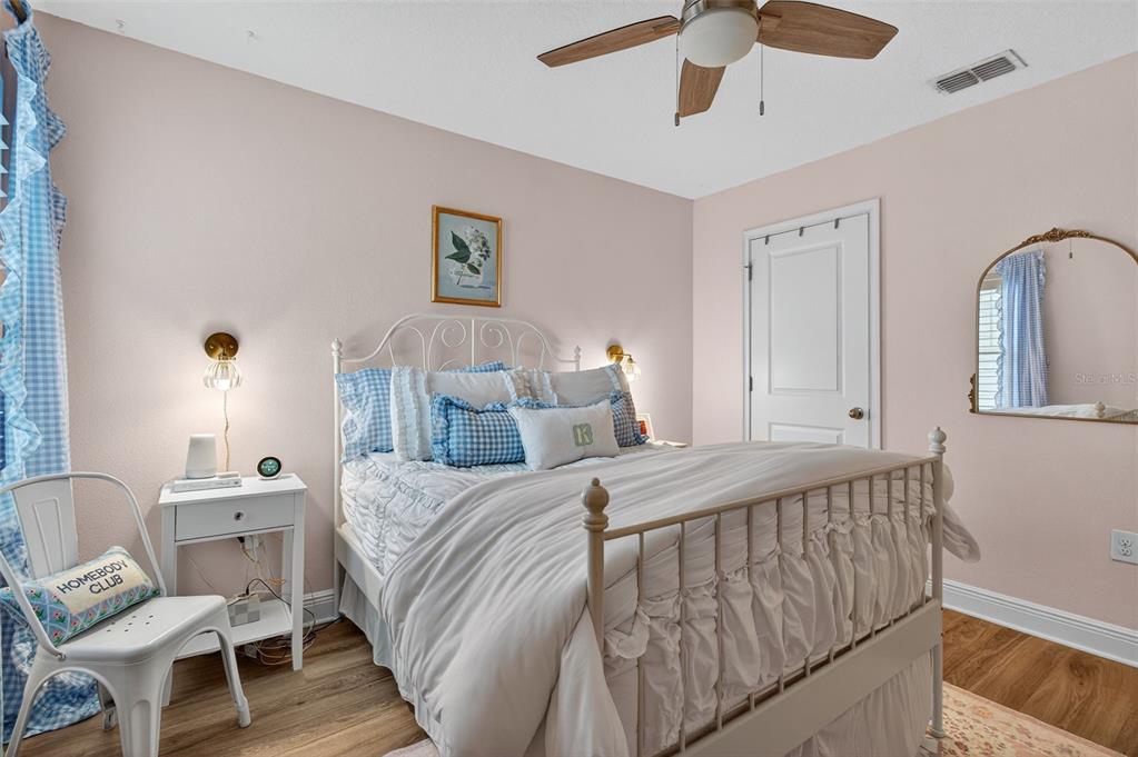 2007 Palm Key Avenue Oldsmar, FL 34677 - Photo 31 of 54 a bedroom with a bed and a chandelier