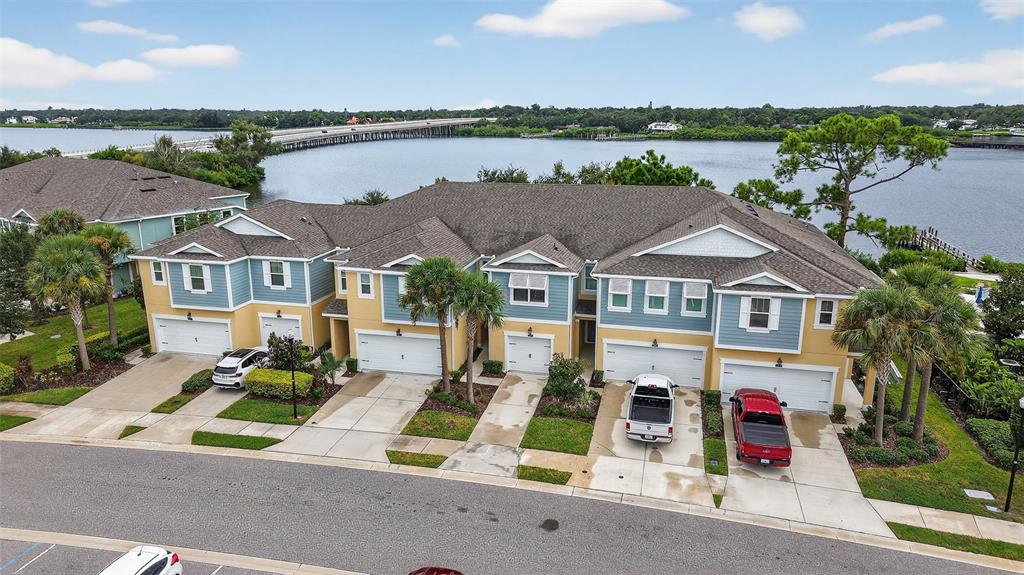2007 Palm Key Avenue Oldsmar, FL 34677 - Photo 53 of 54 an aerial view of multiple houses with a lake