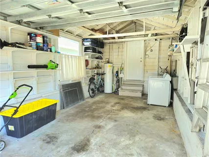 a view of a room with washer and dryer