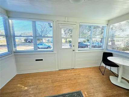 a view of a room with a large window