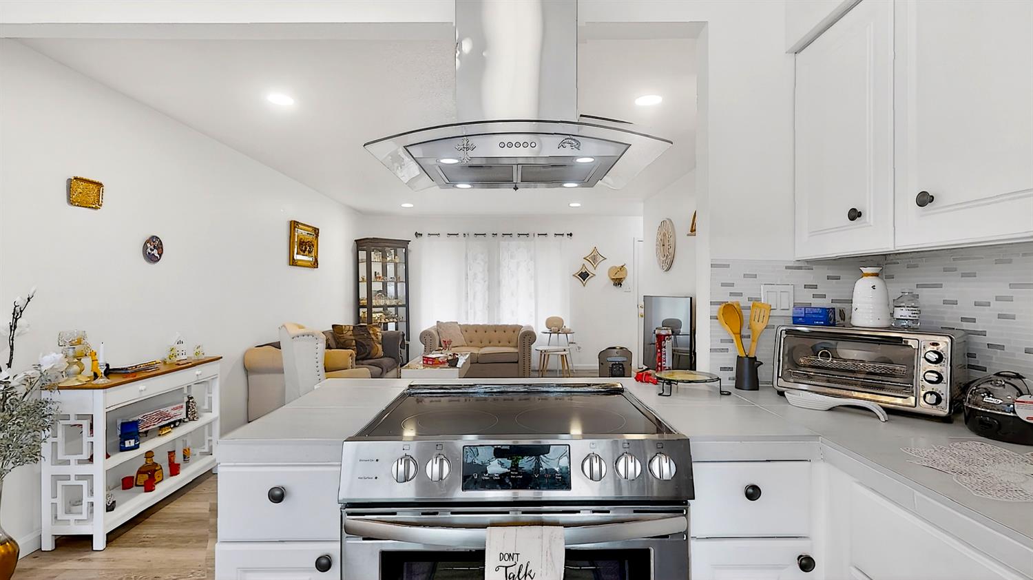 617 West Granger Avenue, Unit 66 Modesto, CA 95350 - Photo 14 of 46 a kitchen with stainless steel appliances granite countertop a stove and a refrigerator