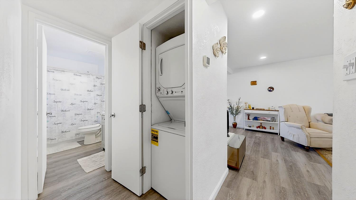 617 West Granger Avenue, Unit 66 Modesto, CA 95350 - Photo 17 of 46 a living room with furniture and a wooden floor
