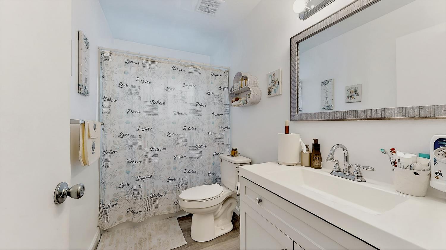 617 West Granger Avenue, Unit 66 Modesto, CA 95350 - Photo 18 of 46 a bathroom with a sink toilet and shower