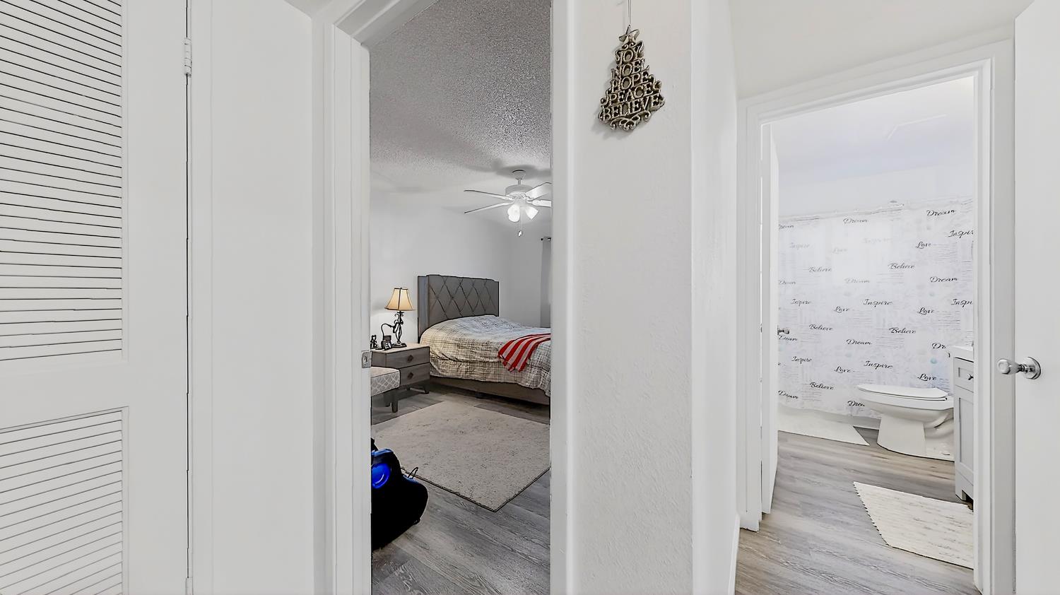 617 West Granger Avenue, Unit 66 Modesto, CA 95350 - Photo 19 of 46 a view of a bedroom from a hallway