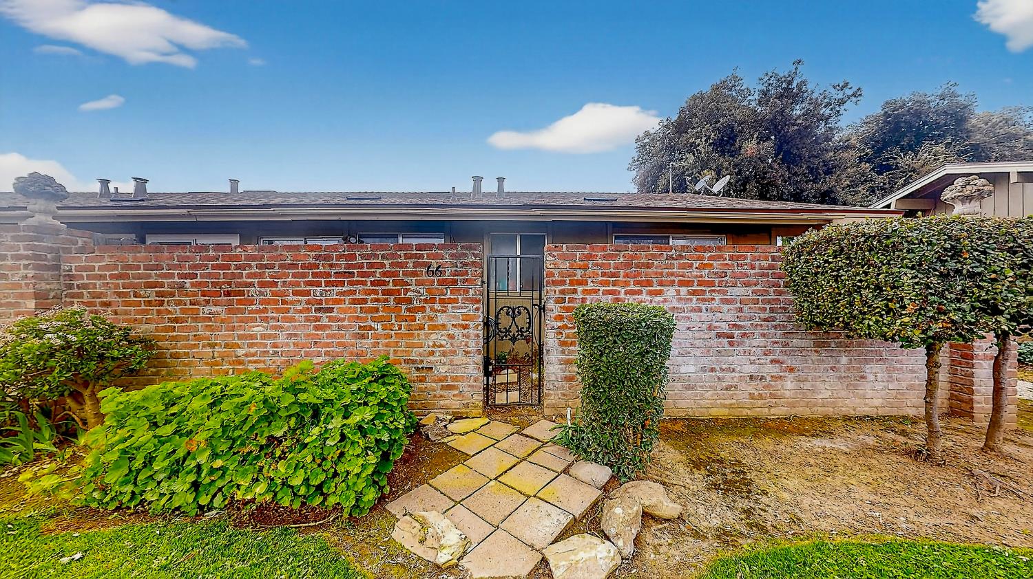 617 West Granger Avenue, Unit 66 Modesto, CA 95350 - Photo 26 of 46 a view of a pathway of the house