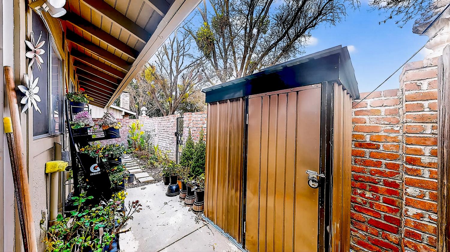 617 West Granger Avenue, Unit 66 Modesto, CA 95350 - Photo 27 of 46 a view of path along with potted plant