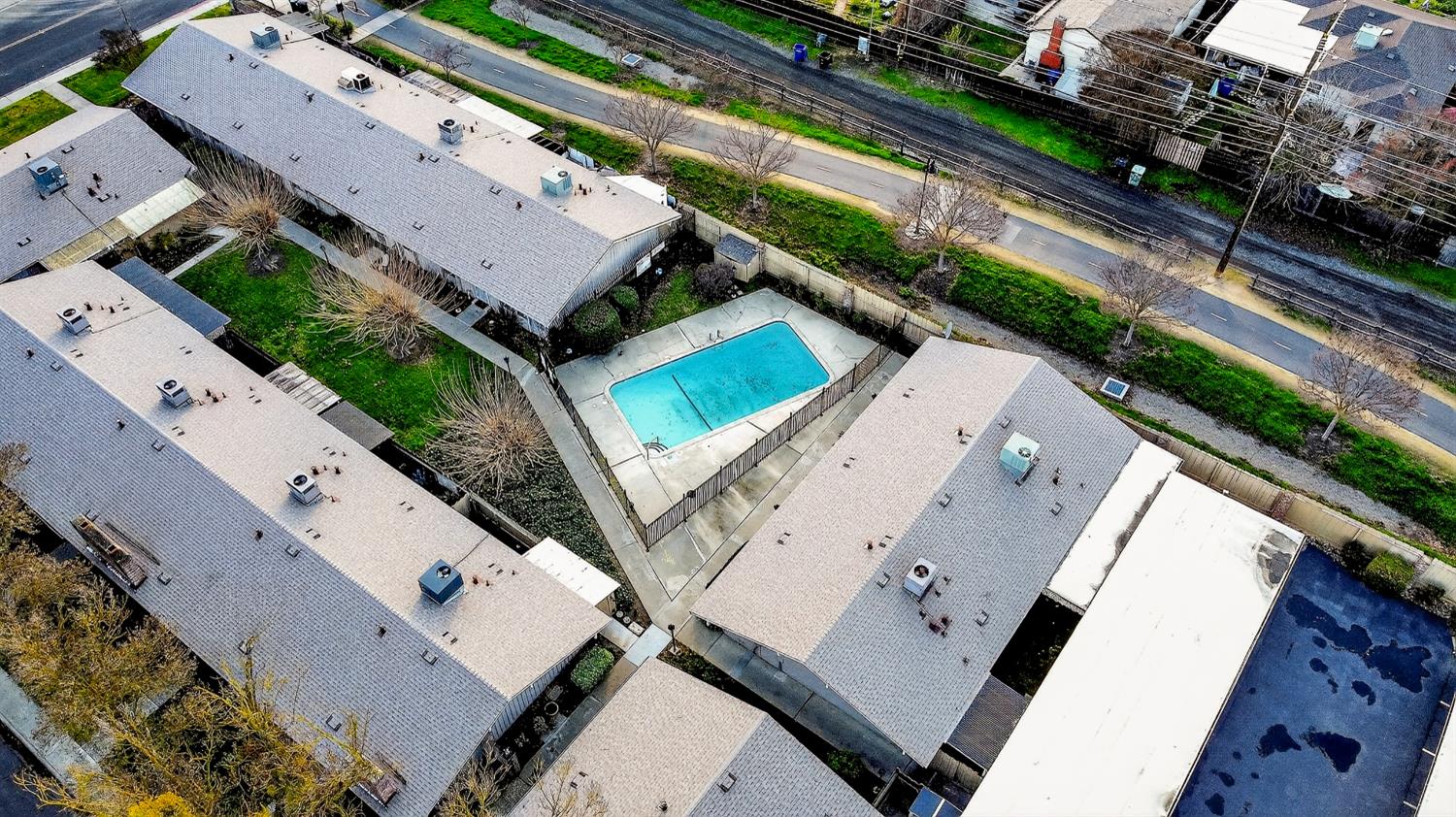617 West Granger Avenue, Unit 66 Modesto, CA 95350 - Photo 38 of 46 an aerial view of a house with a yard