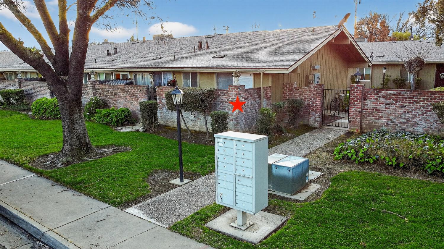 617 West Granger Avenue, Unit 66 Modesto, CA 95350 - Photo 45 of 46 a front view of a house with garden