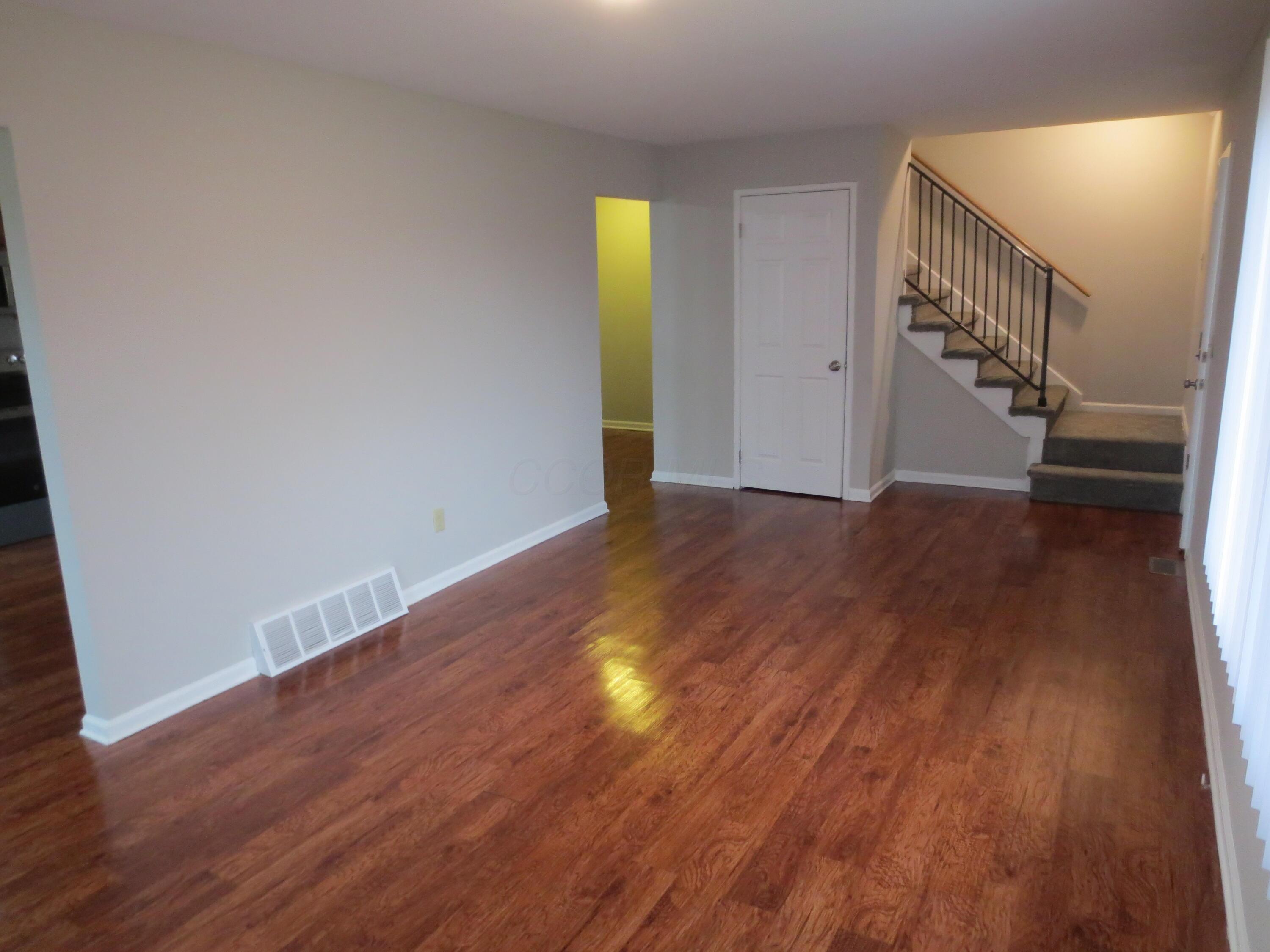 Living room view to stairs