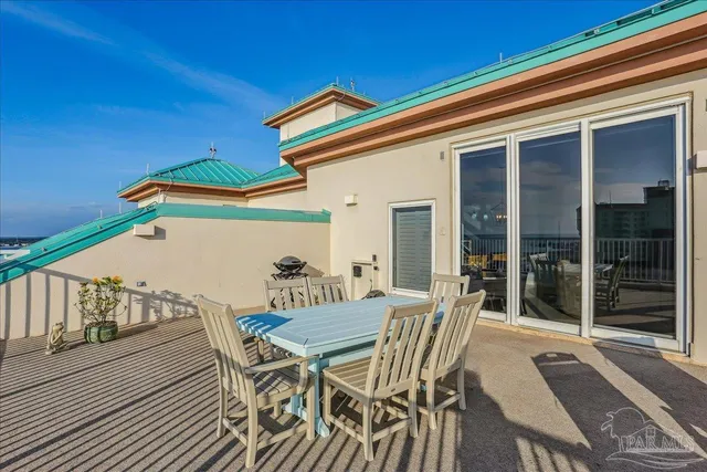 a view of a balcony with an ocean view