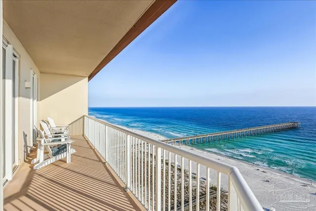 a view of balcony with wooden floor