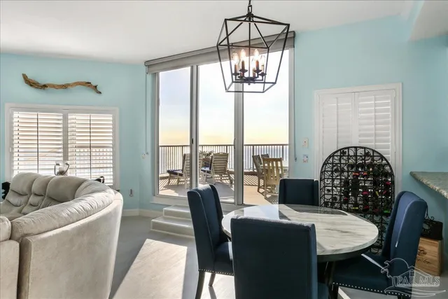 a roof deck with outdoor seating and city view