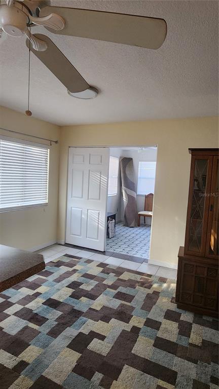Undisclosed Address North Port, FL 34287 - Photo 21 of 27 a bedroom with a bed and wooden floor