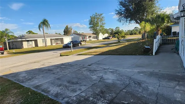 a house with swimming pool in front of it