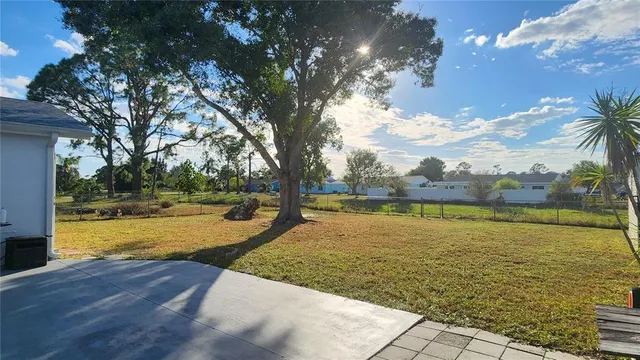 a hallway with sliding door and wooden floor