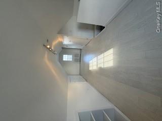 733 East Walnut Street, Unit UPPR Long Beach, NY 11561 - Photo 12 of 26 a view of a room with a fireplace