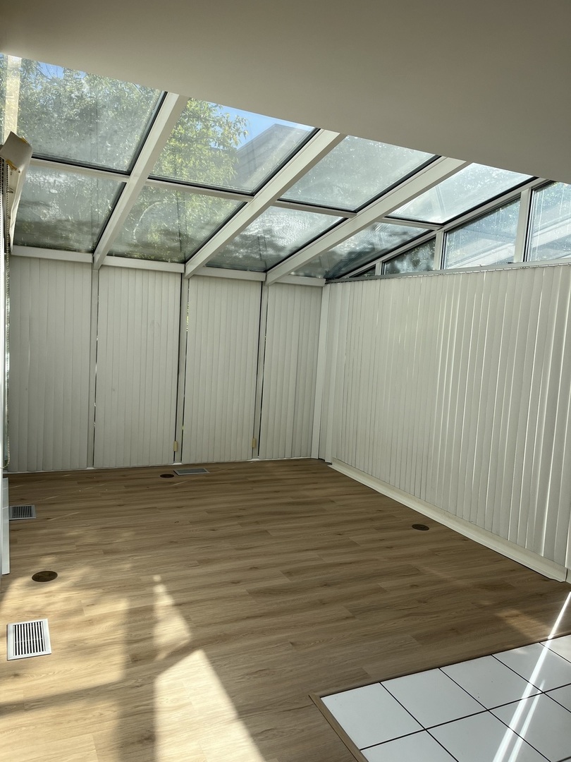 501 Kelburn Road Deerfield, IL 60015 - Photo 5 of 15 a view of a room with wooden floor