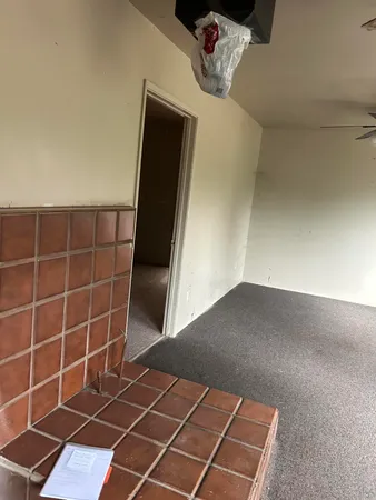 a view of livingroom with furniture and windows