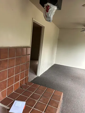 a view of livingroom with furniture and windows