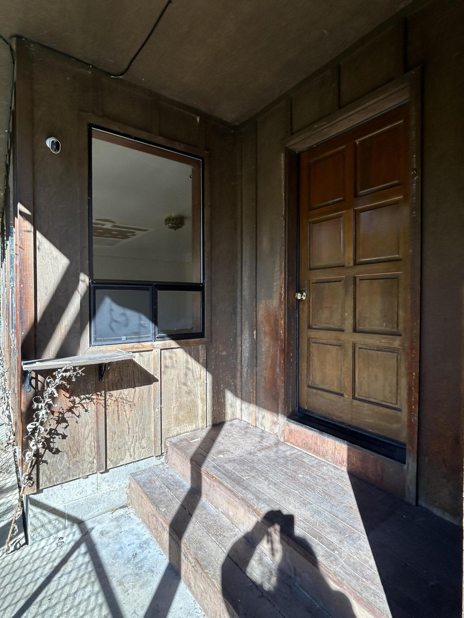 30 Bear Canyon Road Lewiston, CA 96052 - Photo 4 of 64 a bedroom with a bed and a wooden floor