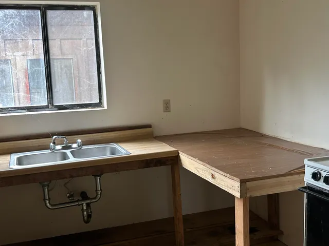 a view of a backyard of a house