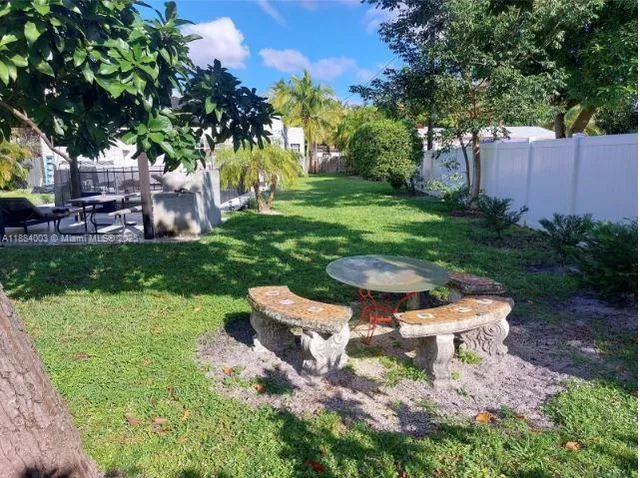 a garden view with a seating space