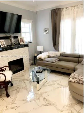 a kitchen with stainless steel appliances granite countertop a sink stove and window