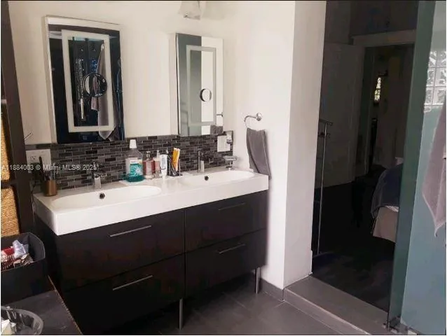 a bathroom with a toilet and a sink