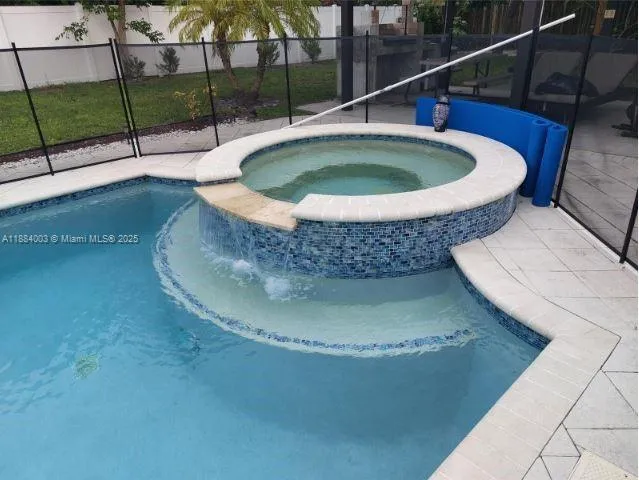 a white bath tub sitting in a bathroom