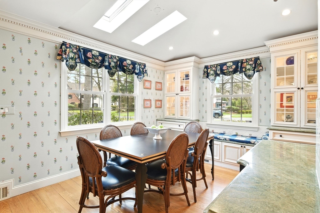 68 Normandy Road Longmeadow, MA 01106 - Photo 12 of 42 a dining room with furniture large windows and wooden floor