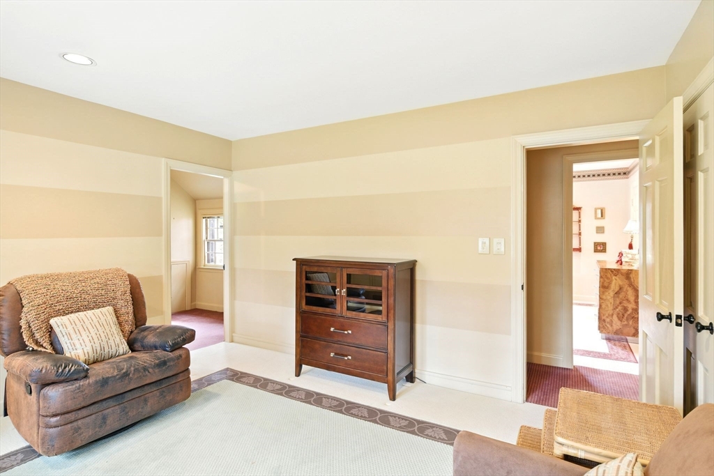68 Normandy Road Longmeadow, MA 01106 - Photo 29 of 42 a living room with furniture and a dresser