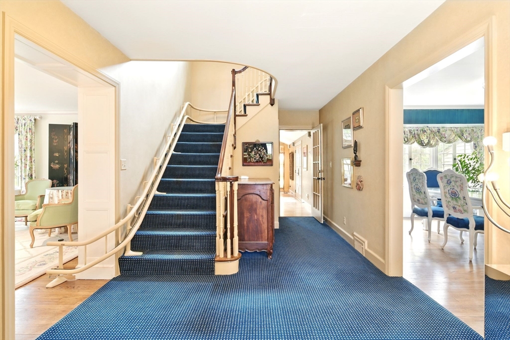68 Normandy Road Longmeadow, MA 01106 - Photo 3 of 42 a view of a hallway with entryway and wooden floor