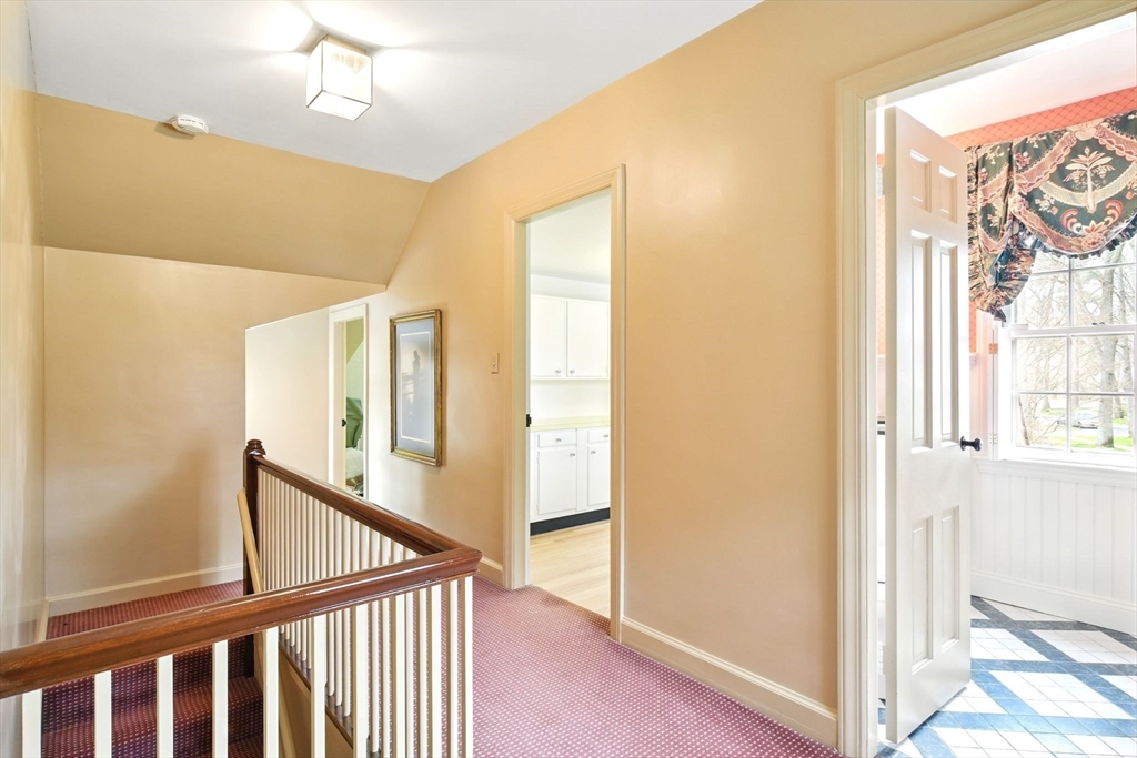68 Normandy Road Longmeadow, MA 01106 - Photo 31 of 42 a view of a livingroom with wooden floor and stairs