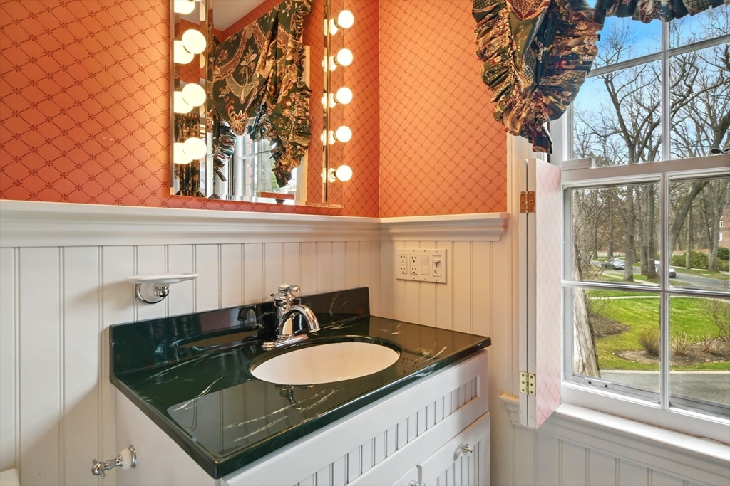 68 Normandy Road Longmeadow, MA 01106 - Photo 32 of 42 a bathroom with a sink and a mirror